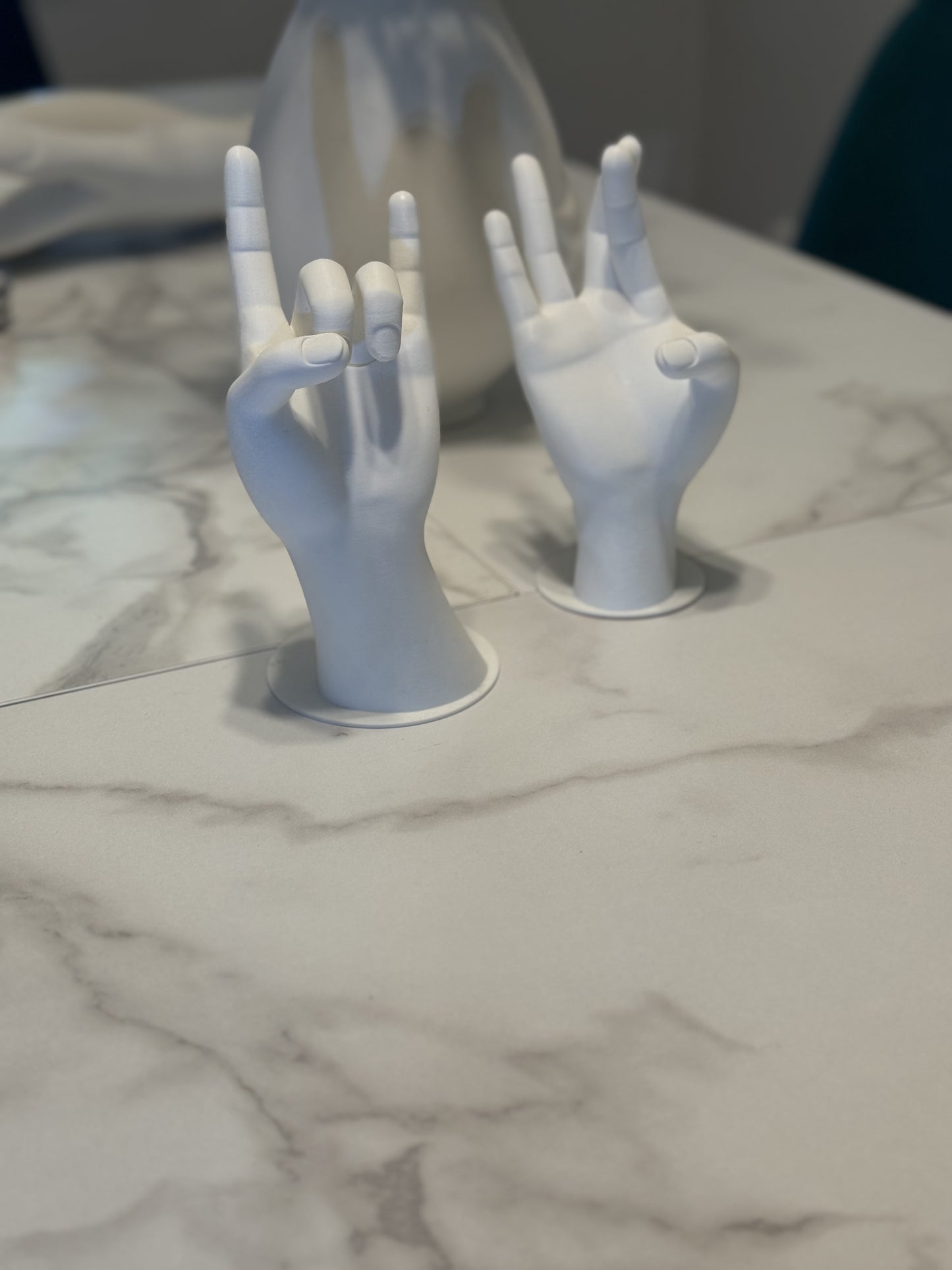 Chic hand-shaped jewelry stand, designed to stylishly hold rings, bracelets, and necklaces on your dresser or vanity