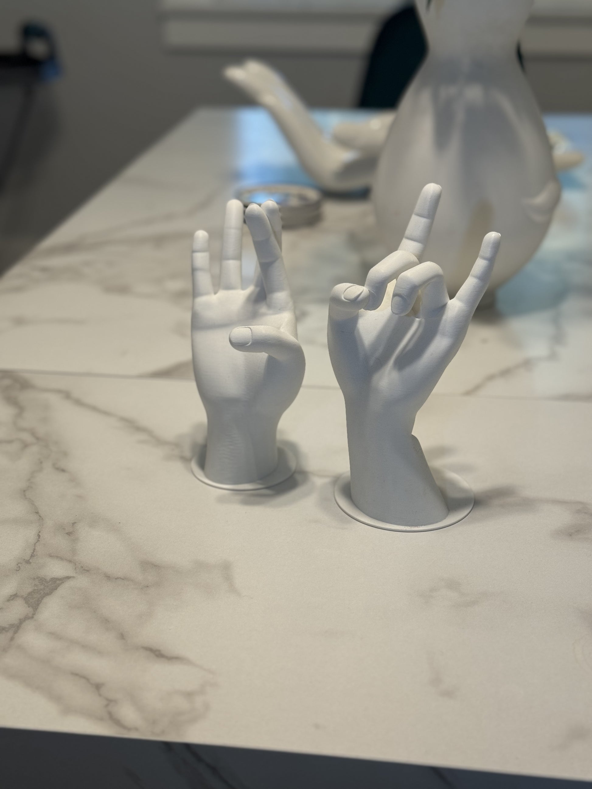 Side profile of the Jewelry Hand Stand, showcasing its artistic design and ample space for jewelry display